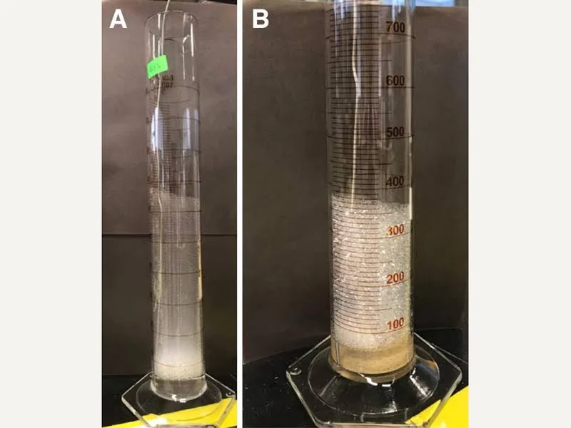 Foam solution samples in graduated measuring cylinders